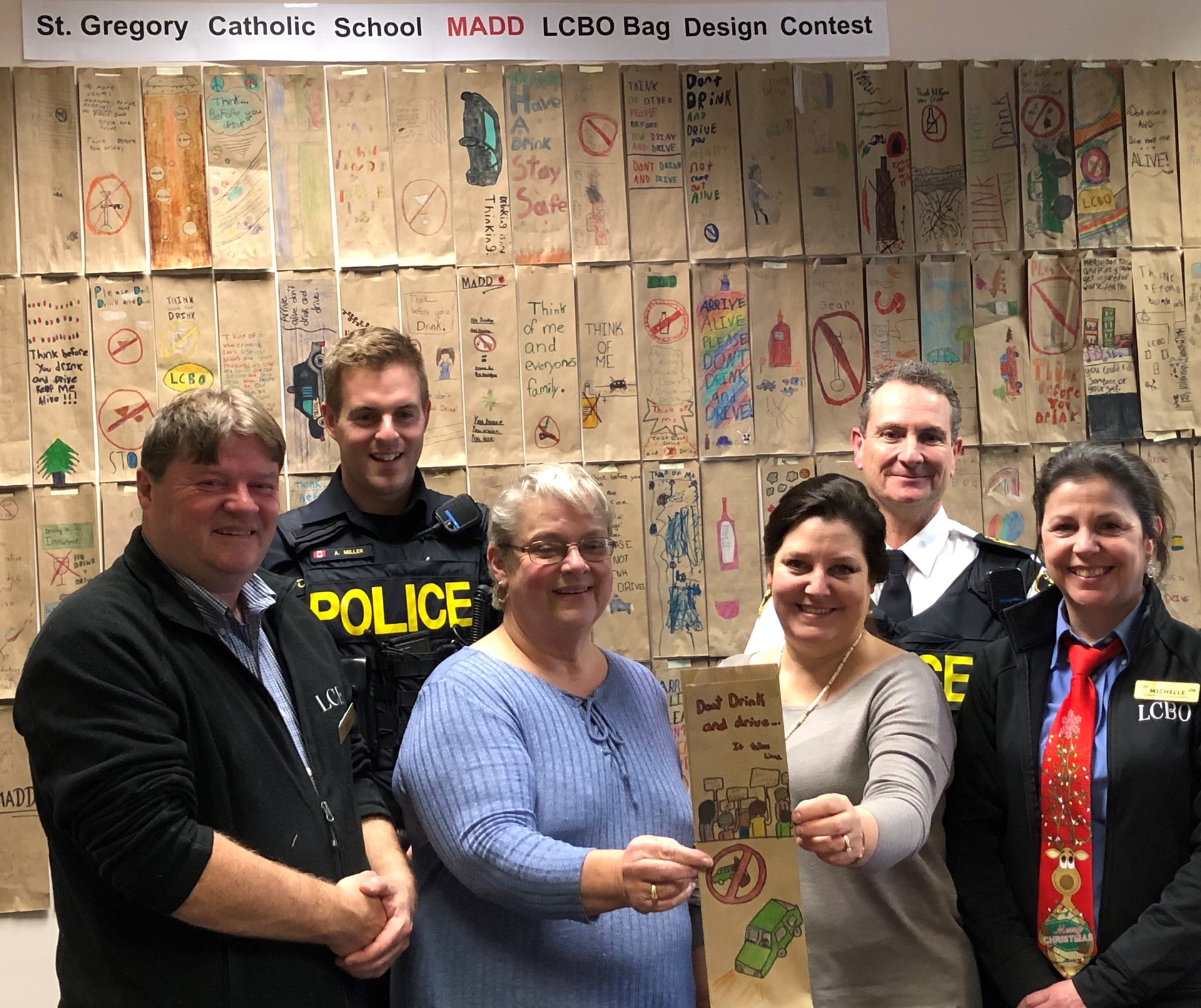 OPP and LCBO and school staff with winning submission 