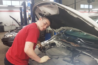 Coop student at automotive work placement.jpg