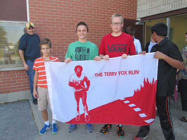 Students holding Terry Fox Run Banner