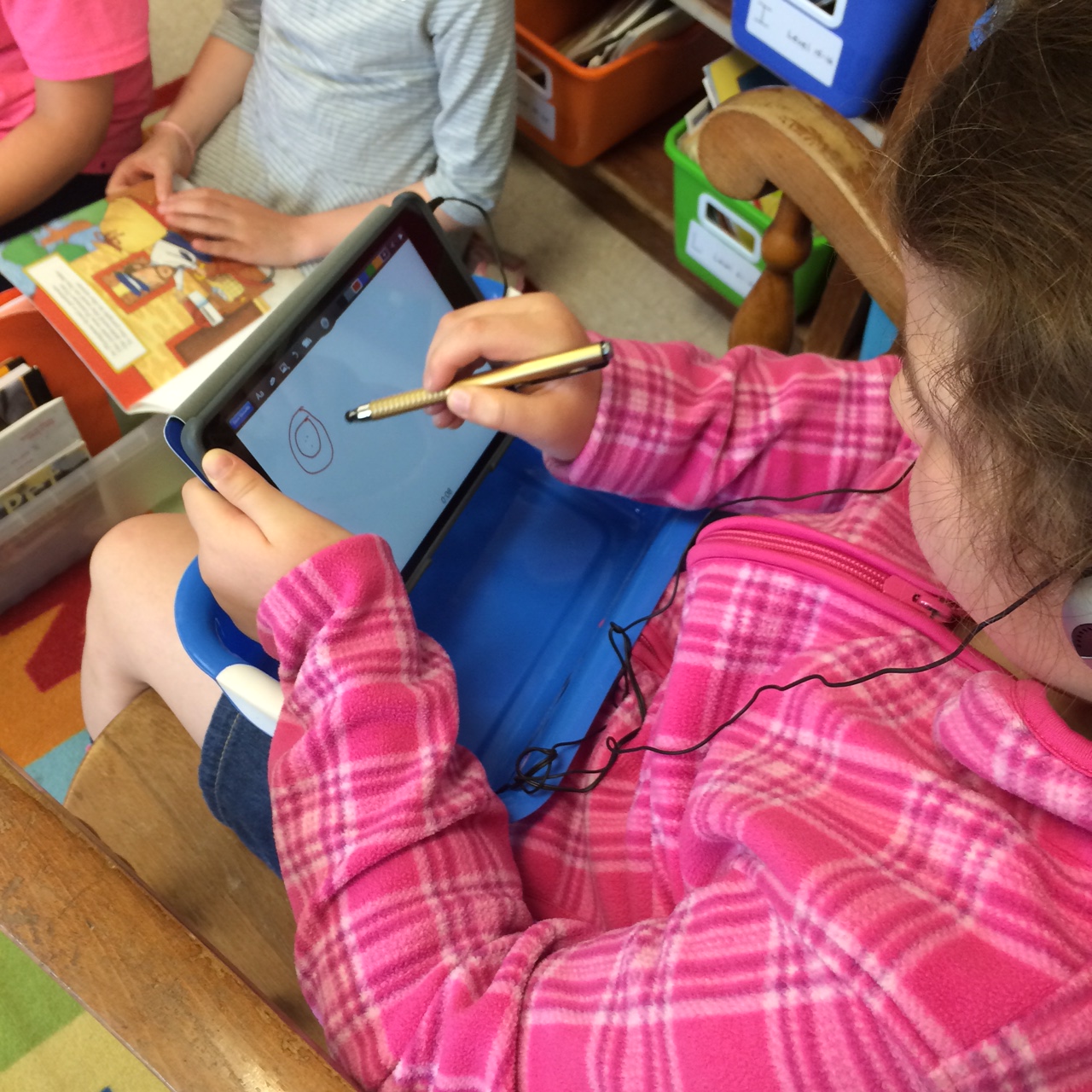 Students using iPads.
